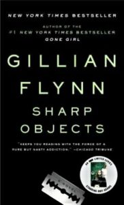 Black bookcover with a small picture of a razor blade and a circular book ad on it. Writers Arcanum - Fiction by Gillian Flynn